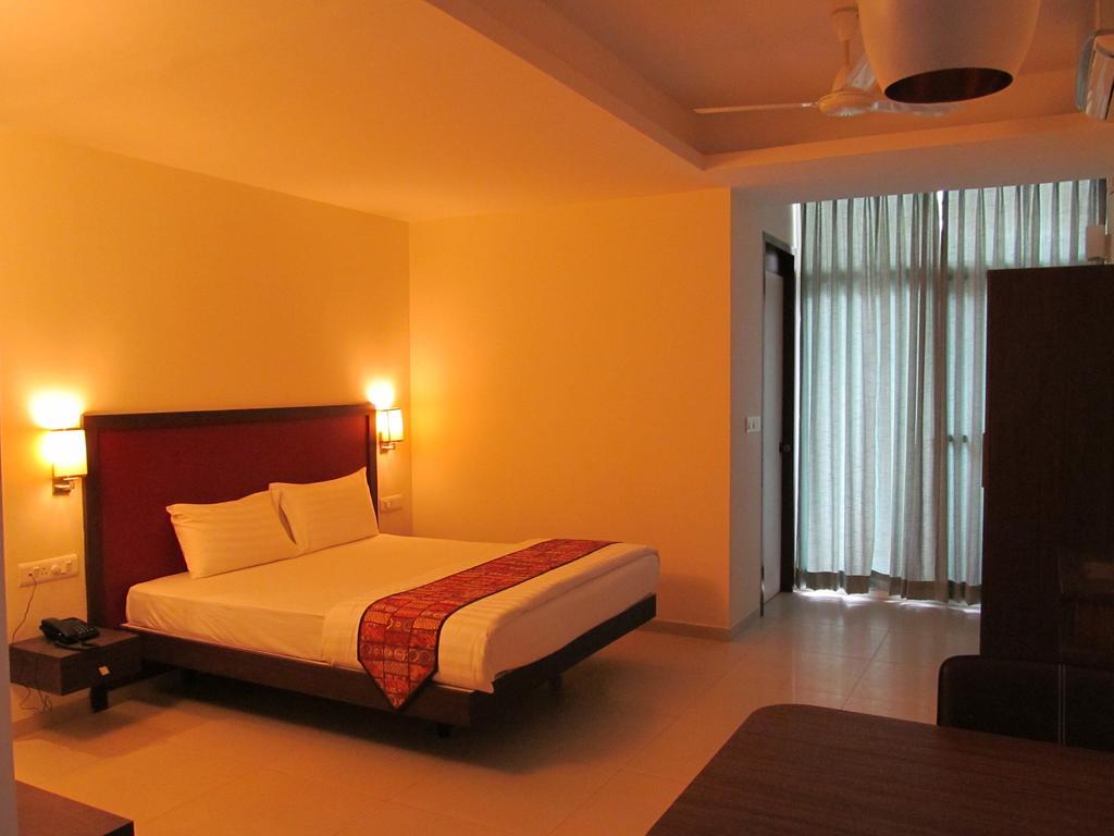 Ixora Suites Bangalore Zimmer foto